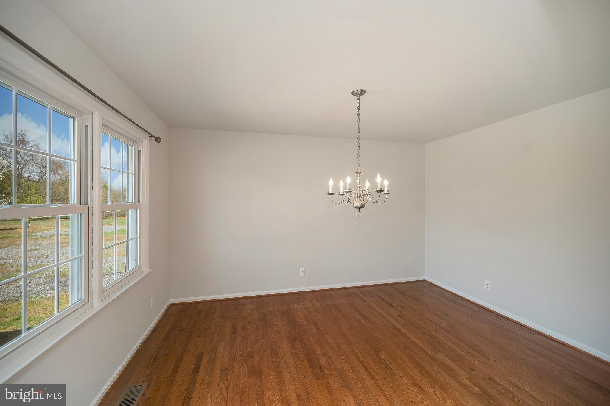 48 Belle Plains Road Fredericksburg, VA 22405 - Photo 18 of 51 a view of a room with wooden floor and windows