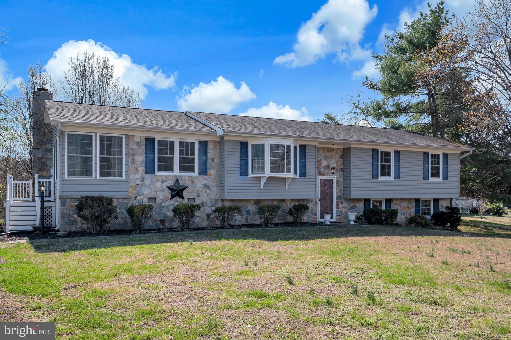 48 Belle Plains Road Fredericksburg, VA 22405 - Photo 2 of 51 a front view of a house with a yard