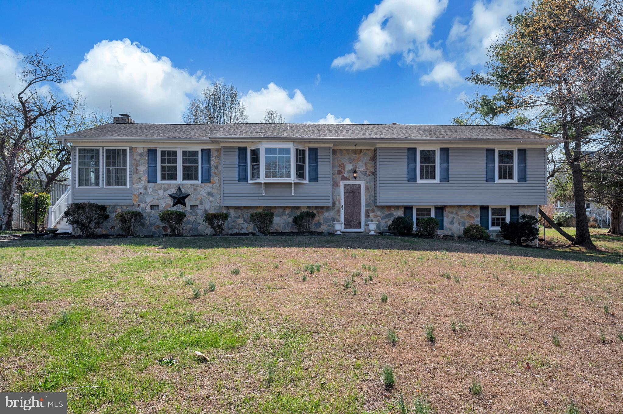 48 Belle Plains Road Fredericksburg, VA 22405 - Photo 3 of 51 a front view of a house with a yard