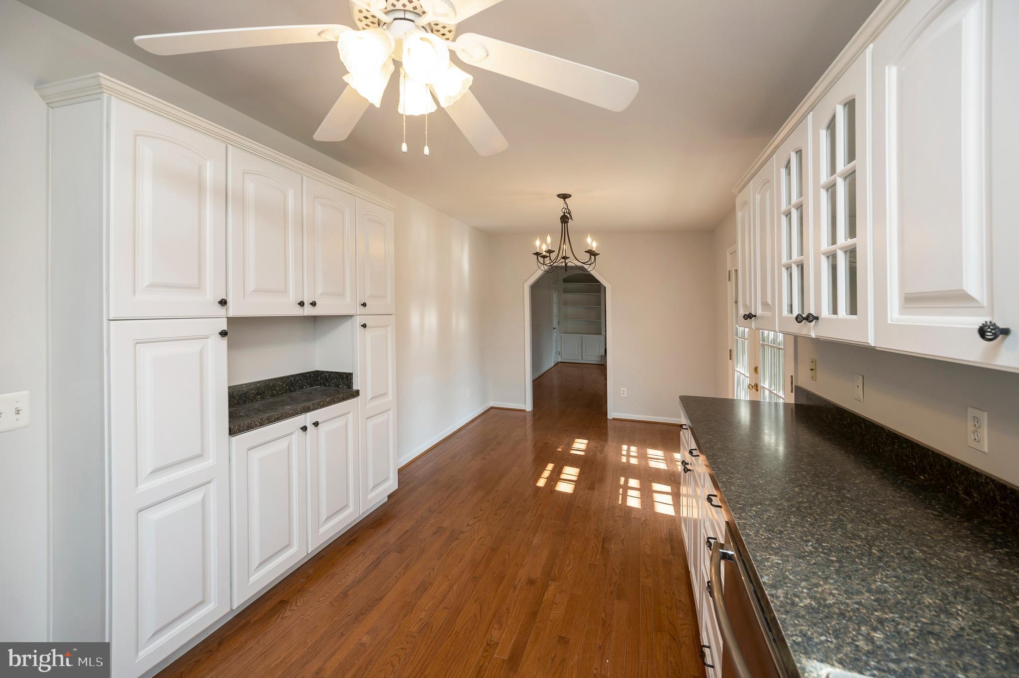 48 Belle Plains Road Fredericksburg, VA 22405 - Photo 33 of 51 a kitchen with granite countertop a stove a sink and a refrigerator