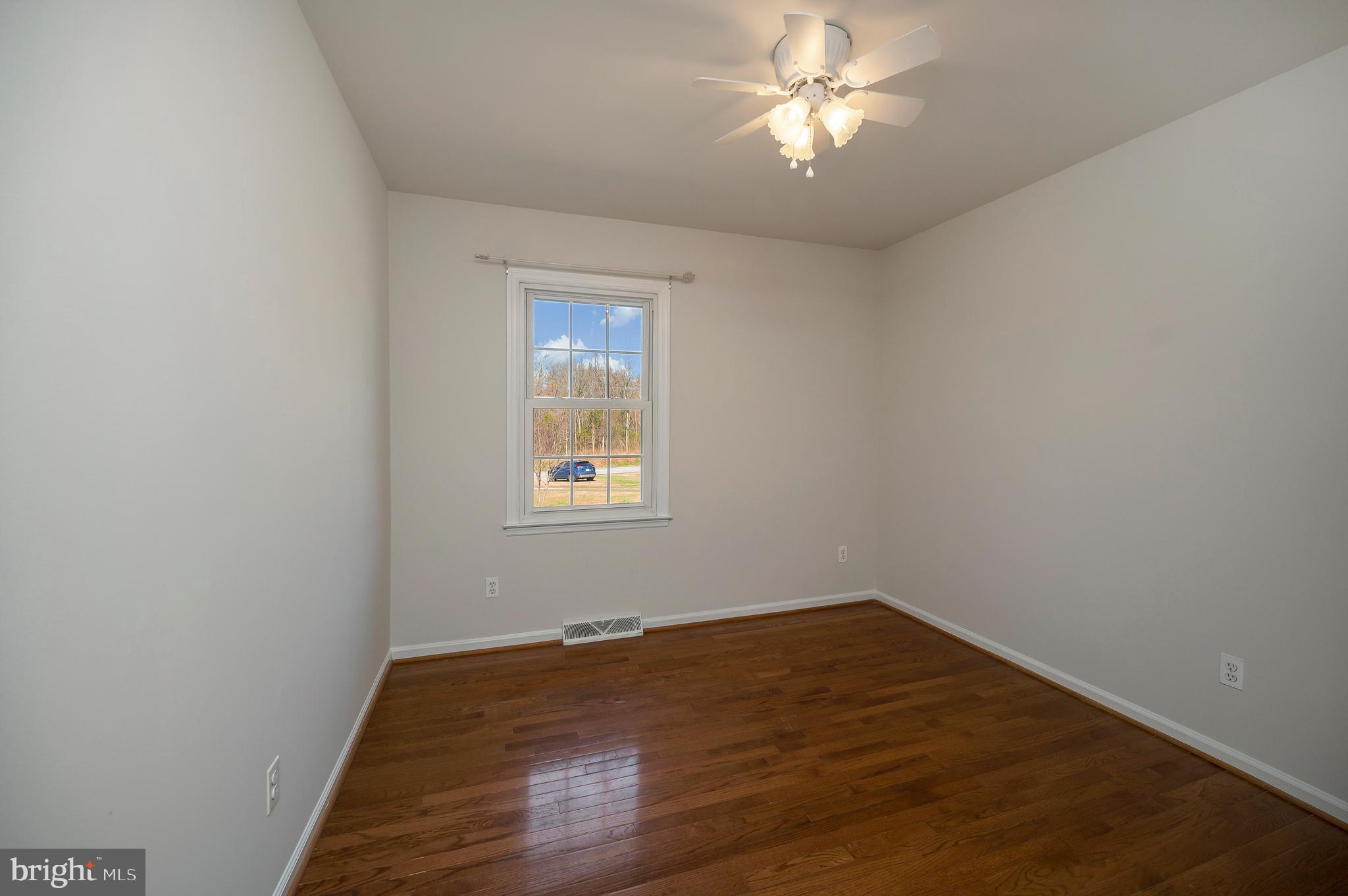 48 Belle Plains Road Fredericksburg, VA 22405 - Photo 39 of 51 an empty room with a window and closet