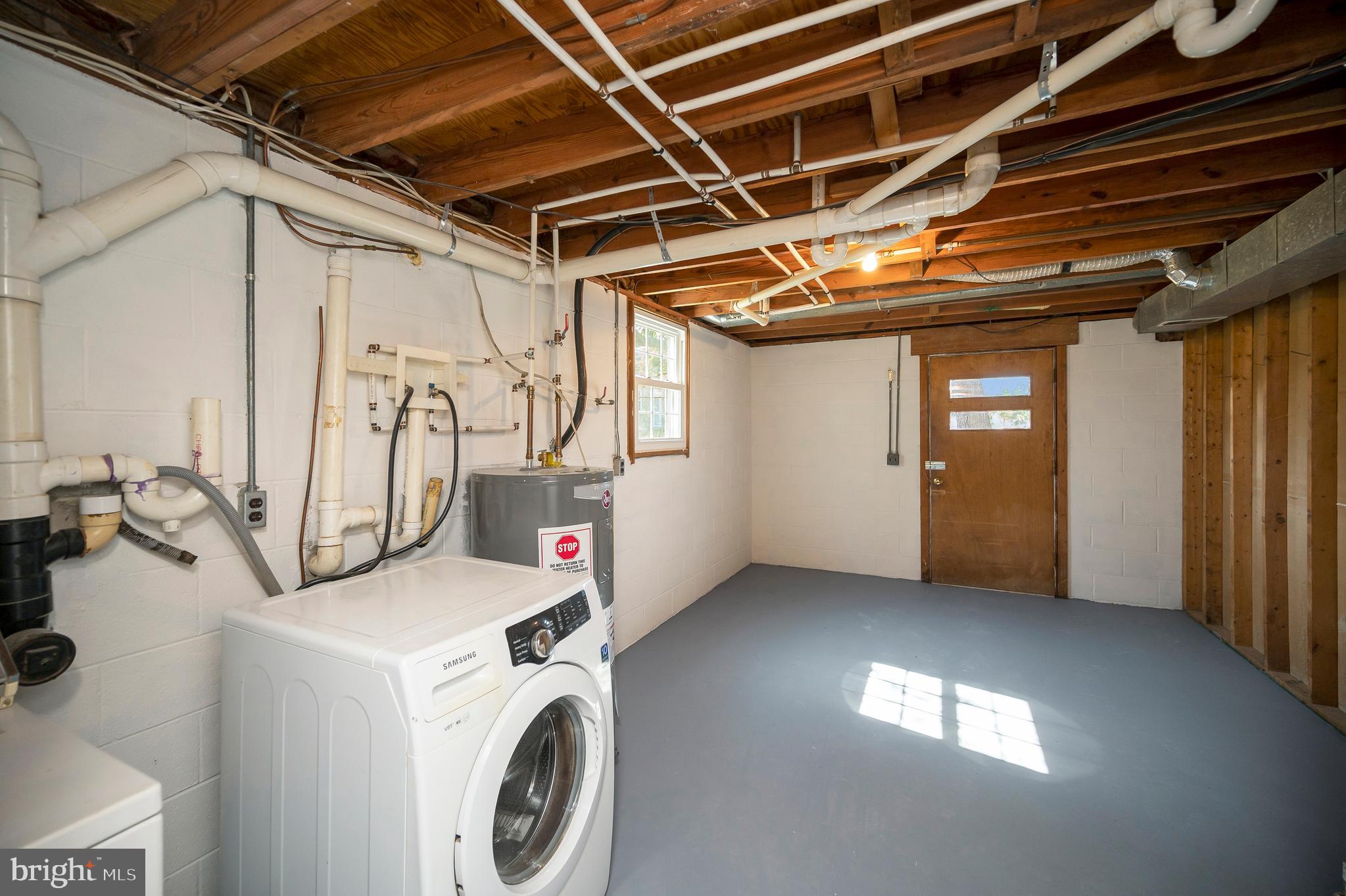 48 Belle Plains Road Fredericksburg, VA 22405 - Photo 49 of 51 a view of a storage & utility room with washer and dryer