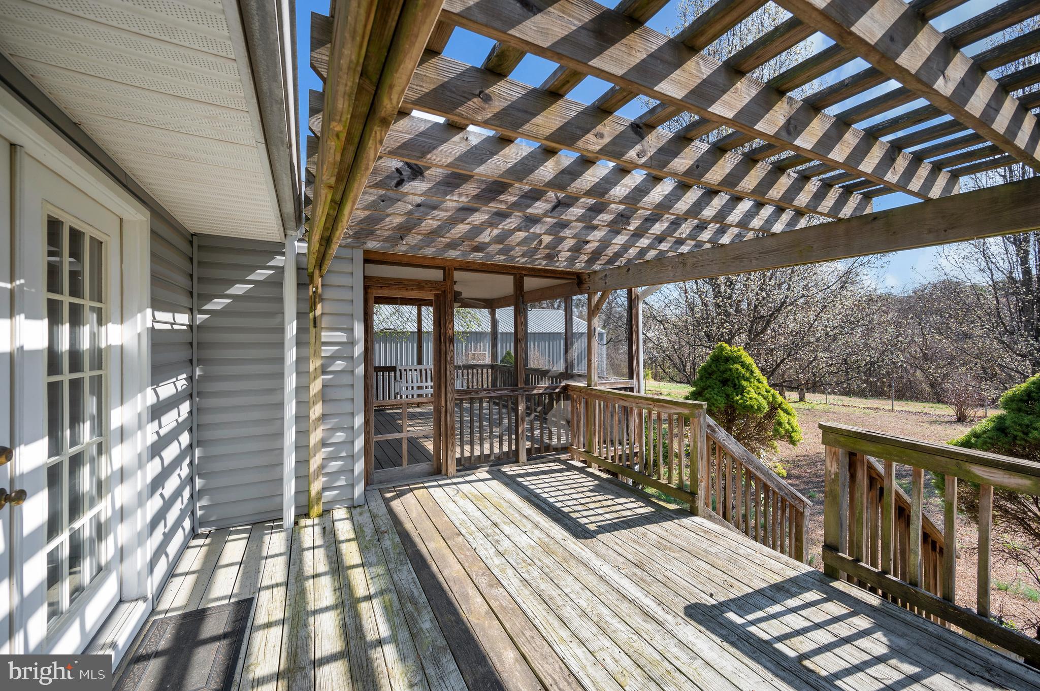 48 Belle Plains Road Fredericksburg, VA 22405 - Photo 10 of 51 a balcony with wooden floor