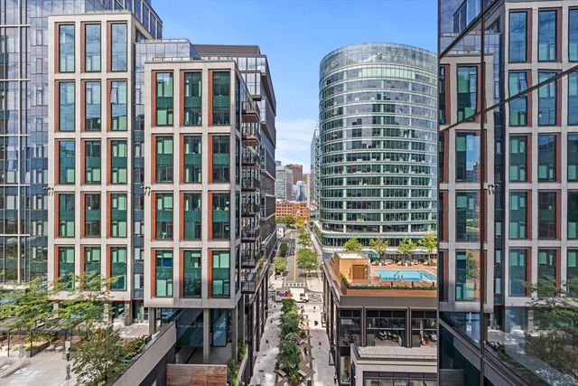 a front view of a building with glass windows