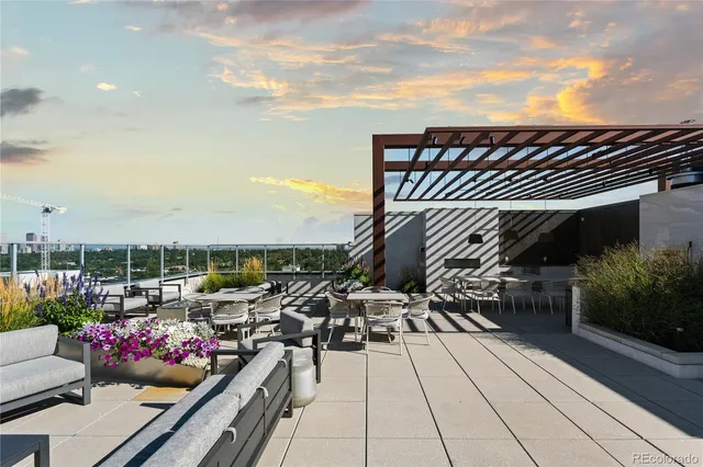 a view of roof deck with seating space