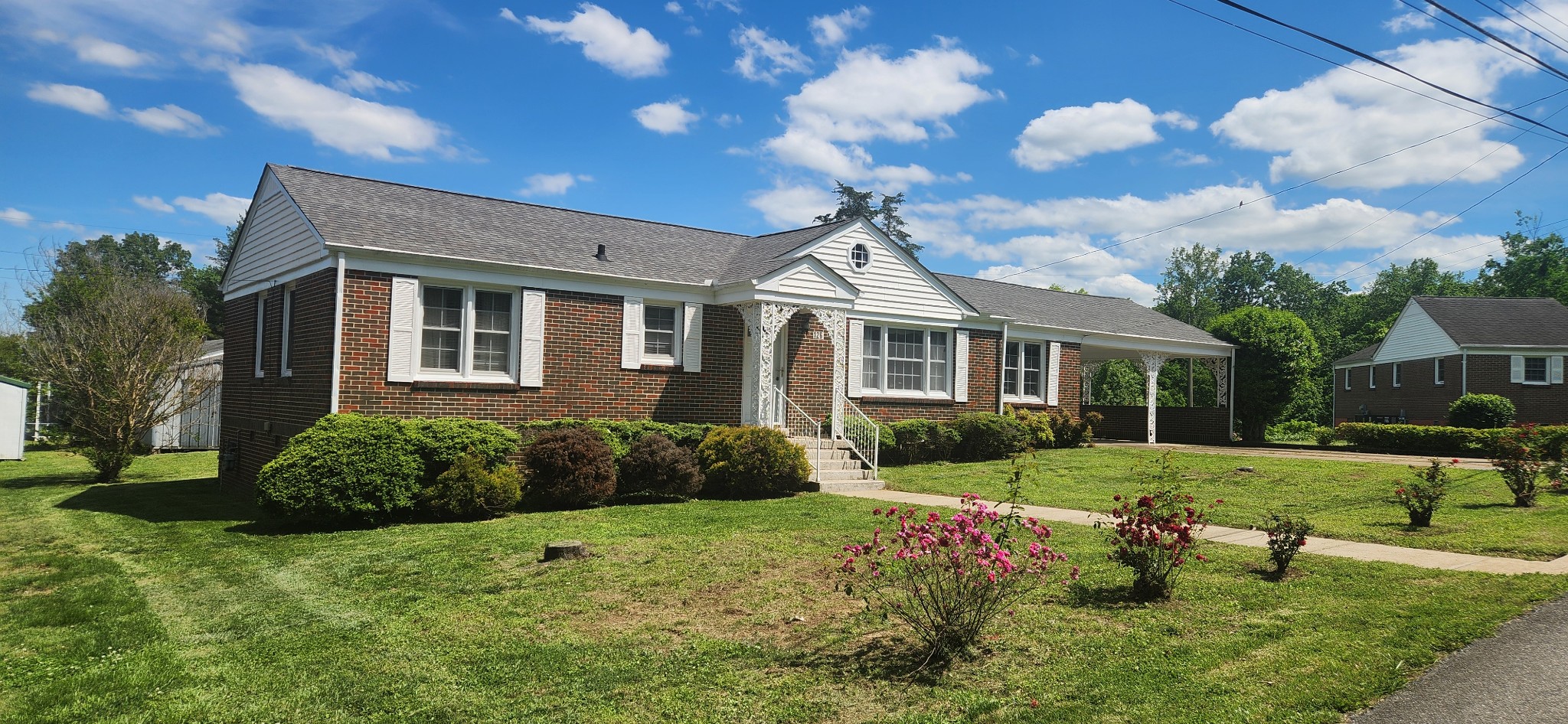 126 Riverside Drive Centerville, TN 37033 - Photo 1 of 19 a front view of a house with garden