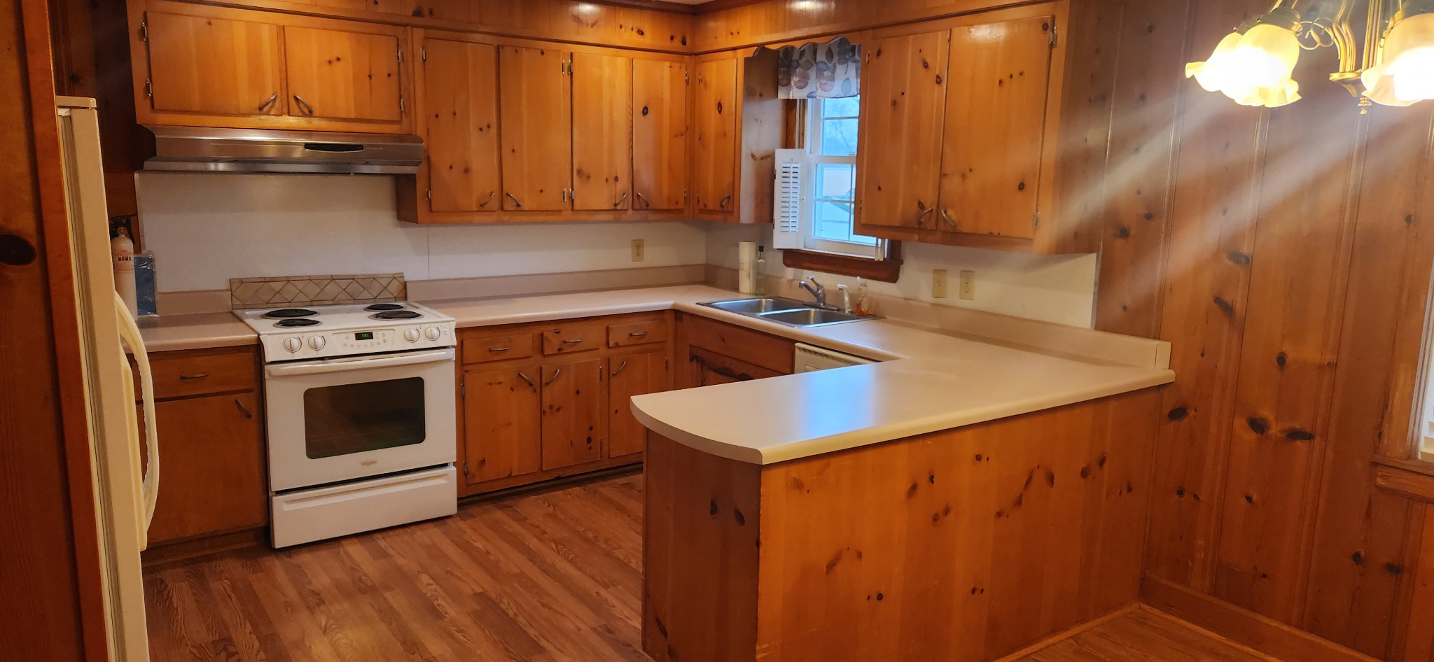 126 Riverside Drive Centerville, TN 37033 - Photo 5 of 19 a kitchen with a sink a stove and cabinets