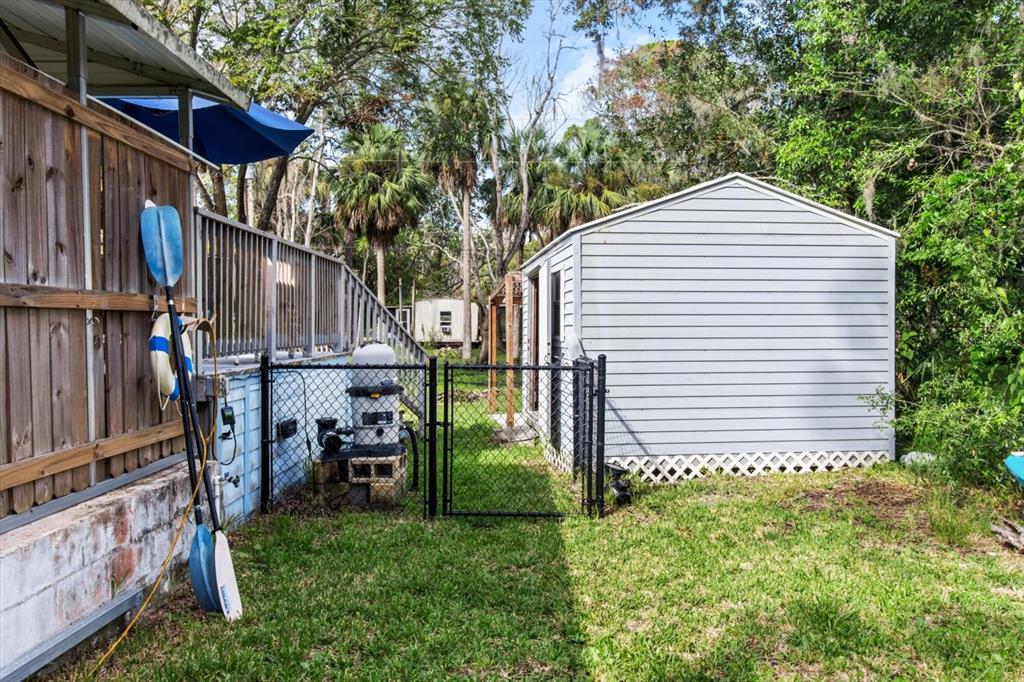 7 65th Street Yankeetown, FL 34498 - Photo 24 of 43 a view of backyard of house