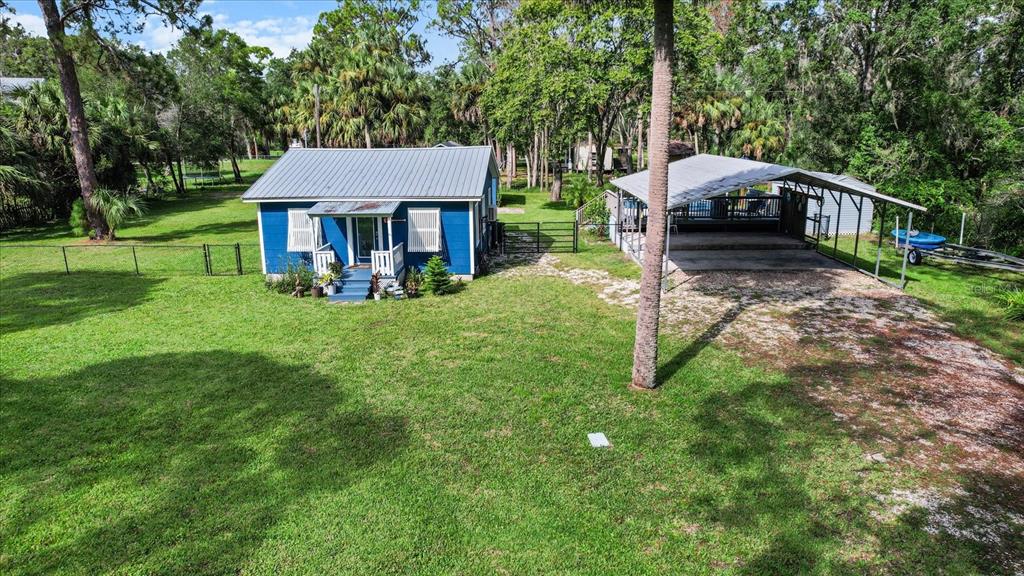 7 65th Street Yankeetown, FL 34498 - Photo 28 of 43 a view of a house with backyard