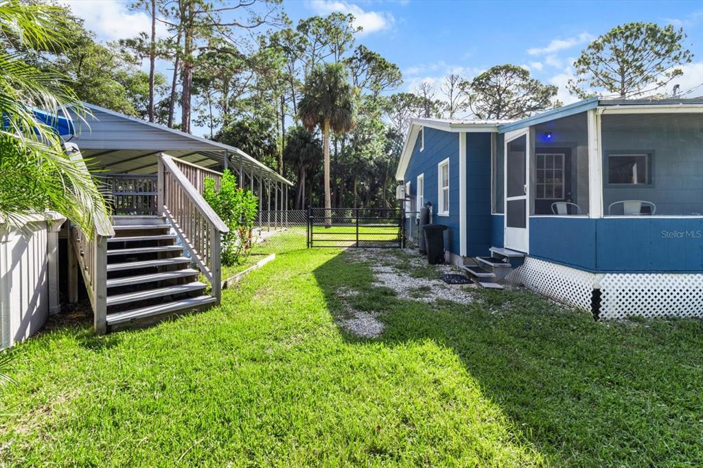 7 65th Street Yankeetown, FL 34498 - Photo 34 of 43 a view of a house with backyard and porch