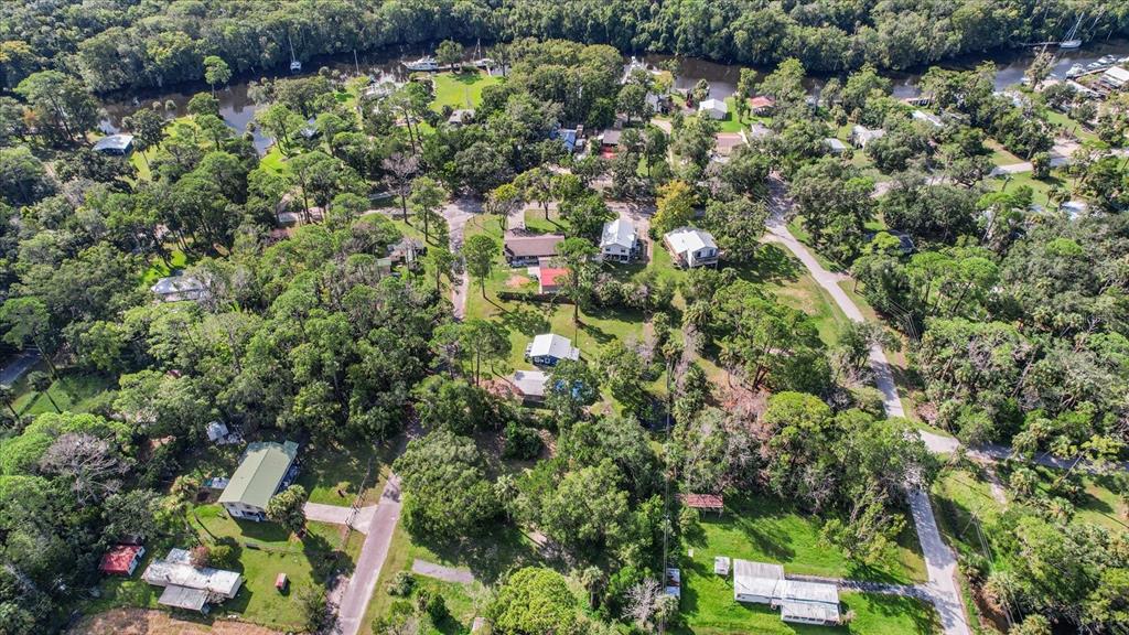 7 65th Street Yankeetown, FL 34498 - Photo 42 of 43 an aerial view of residential houses with outdoor space and trees
