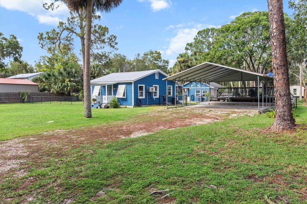 7 65th Street Yankeetown, FL 34498 - Photo 43 of 43 a front view of a house with garden