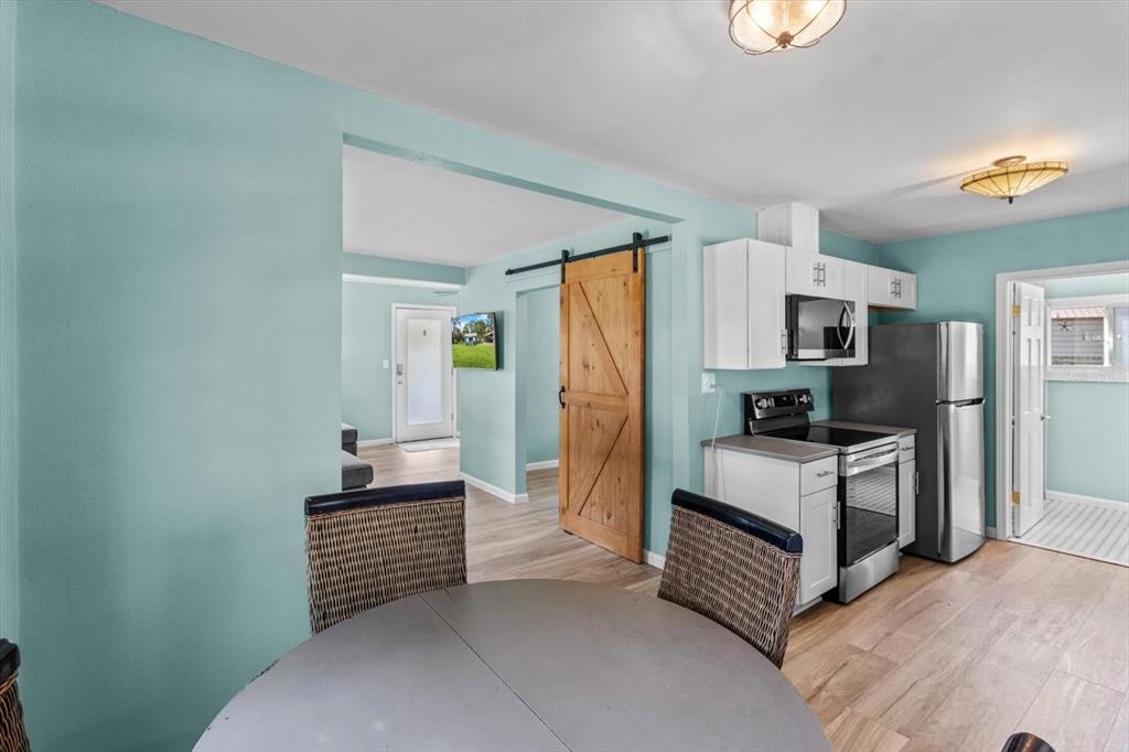 7 65th Street Yankeetown, FL 34498 - Photo 9 of 43 a room with a bed and a television