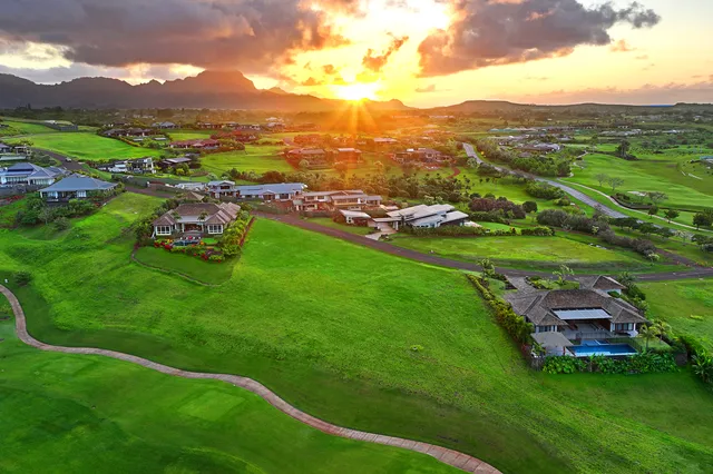 an aerial view of a house with garden