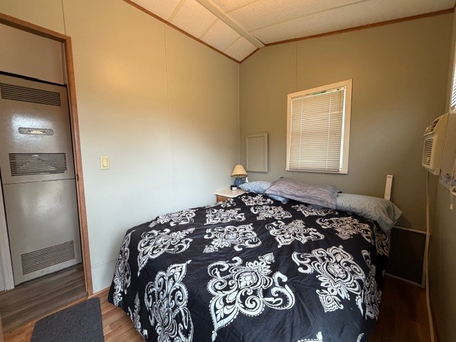 2795 East 28th Road Marseilles, IL 61341 - Photo 12 of 54 a bed sitting in a bedroom next to a window
