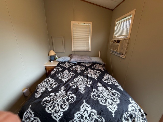 2795 East 28th Road Marseilles, IL 61341 - Photo 14 of 54 a bed sitting in a bedroom next to a window