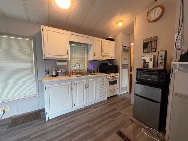 2795 East 28th Road Marseilles, IL 61341 - Photo 3 of 54 a kitchen with stainless steel appliances a refrigerator sink and cabinets
