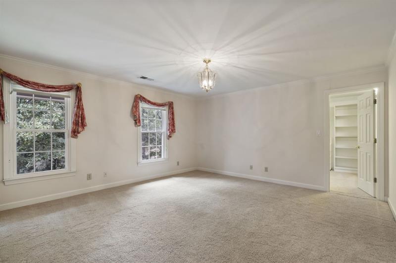 1120 Heards Ferry Road Northwest Sandy Springs, GA 30328 - Photo 23 of 50 a view of an empty room with a window