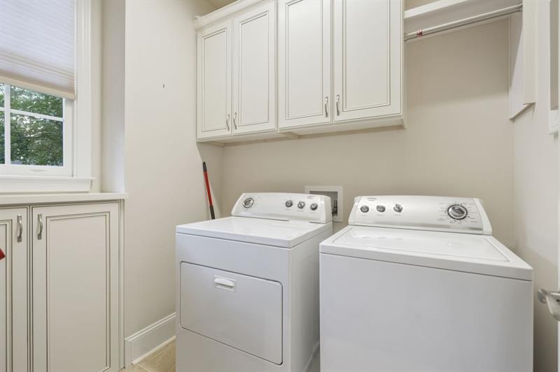 1120 Heards Ferry Road Northwest Sandy Springs, GA 30328 - Photo 40 of 50 a utility room with dryer and washer