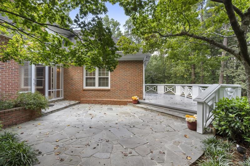 1120 Heards Ferry Road Northwest Sandy Springs, GA 30328 - Photo 44 of 50 a view of back yard of the house