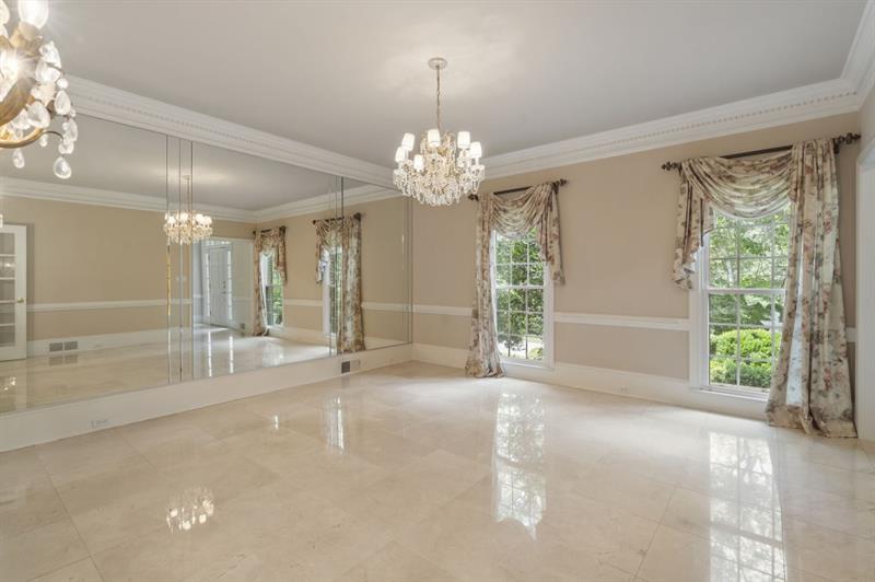 1120 Heards Ferry Road Northwest Sandy Springs, GA 30328 - Photo 6 of 50 a view of an empty room with a window