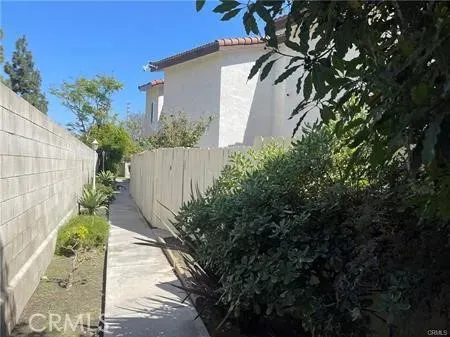 a house with trees in front of it
