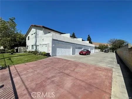 a car parked in front of a house