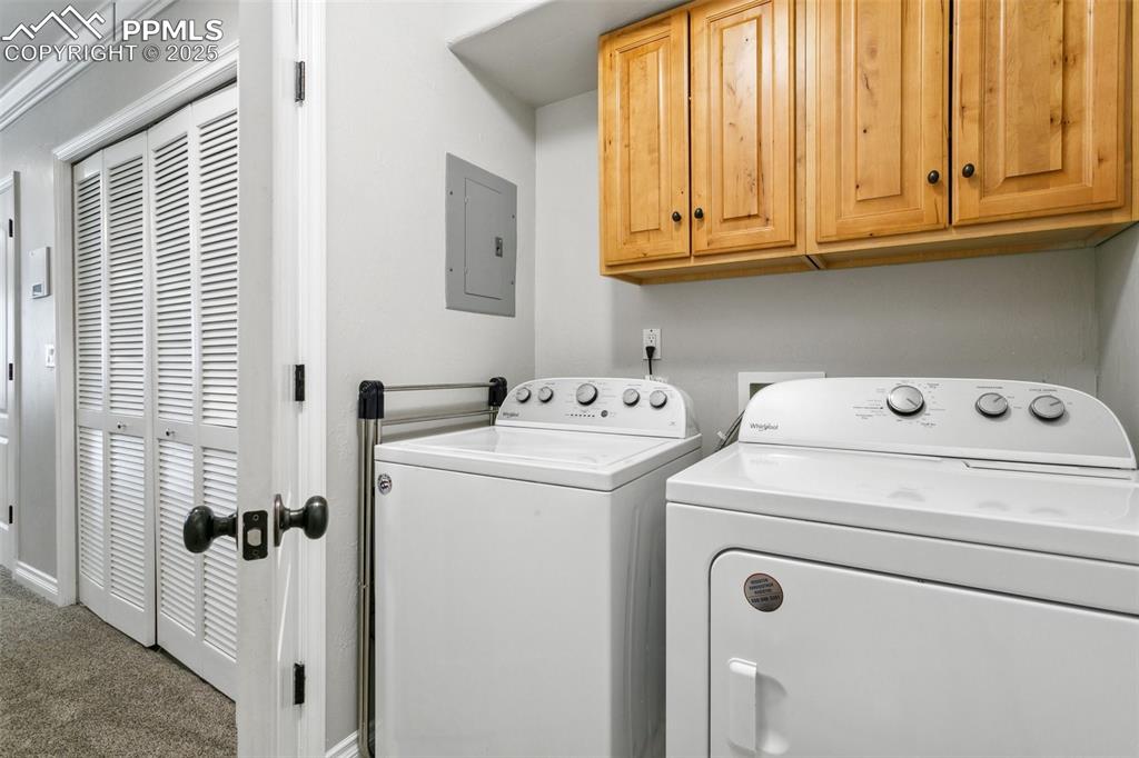 1502 York Road, Unit 103 Colorado Springs, CO 80920 - Photo 12 of 27 a utility room with dryer and washer