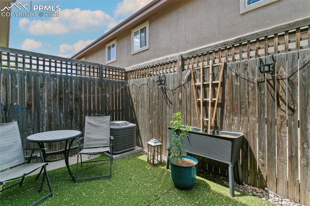 1502 York Road, Unit 103 Colorado Springs, CO 80920 - Photo 26 of 27 a view of a porch with furniture