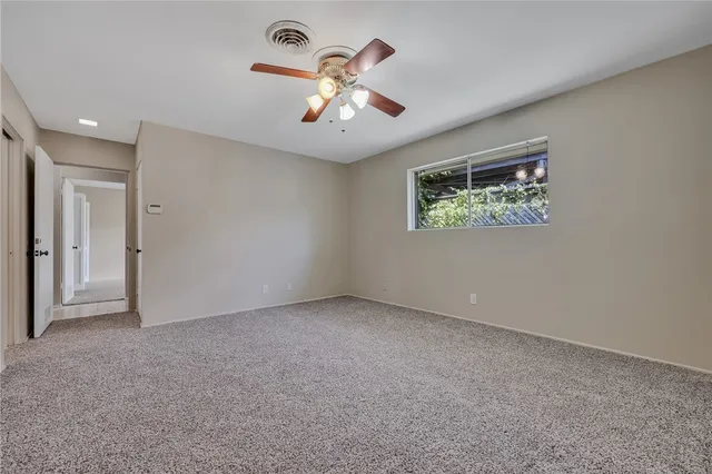 a bathroom with a shower and a bathtub