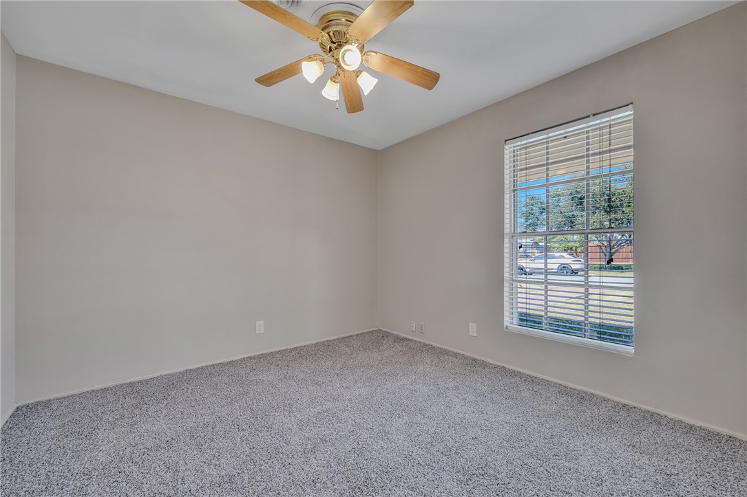 3401 Floyd Street Corpus Christi, TX 78411 - Photo 32 of 39 an empty room with windows and fan