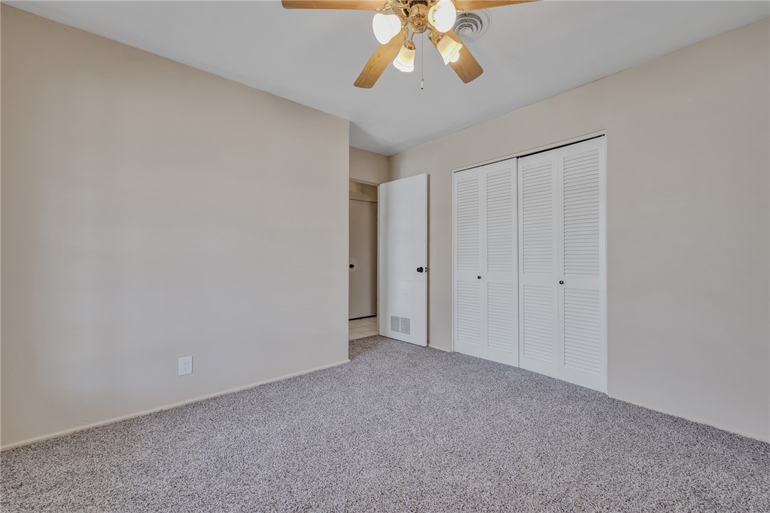 3401 Floyd Street Corpus Christi, TX 78411 - Photo 33 of 39 a view of an empty room with a chandelier fan