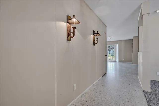a view of a hallway with closet