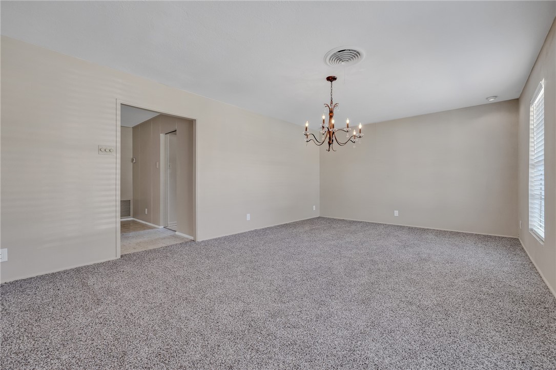3401 Floyd Street Corpus Christi, TX 78411 - Photo 5 of 39 a view of a chandelier and a chandelier fan in big room