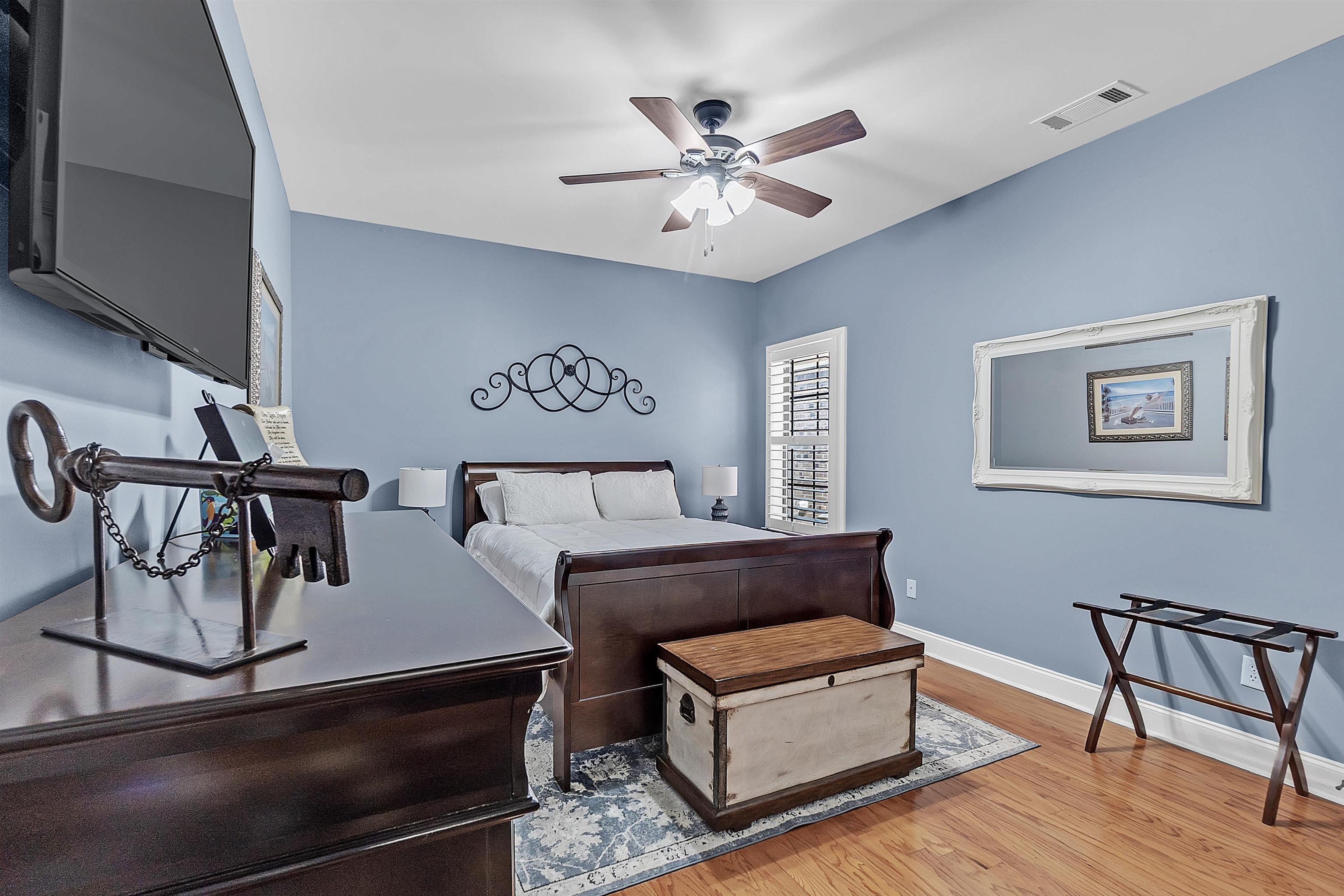 200 Misty Fields Road Oakland, TN 38060 - Photo 26 of 40 Bedroom featuring light wood-style flooring and a ceiling fan