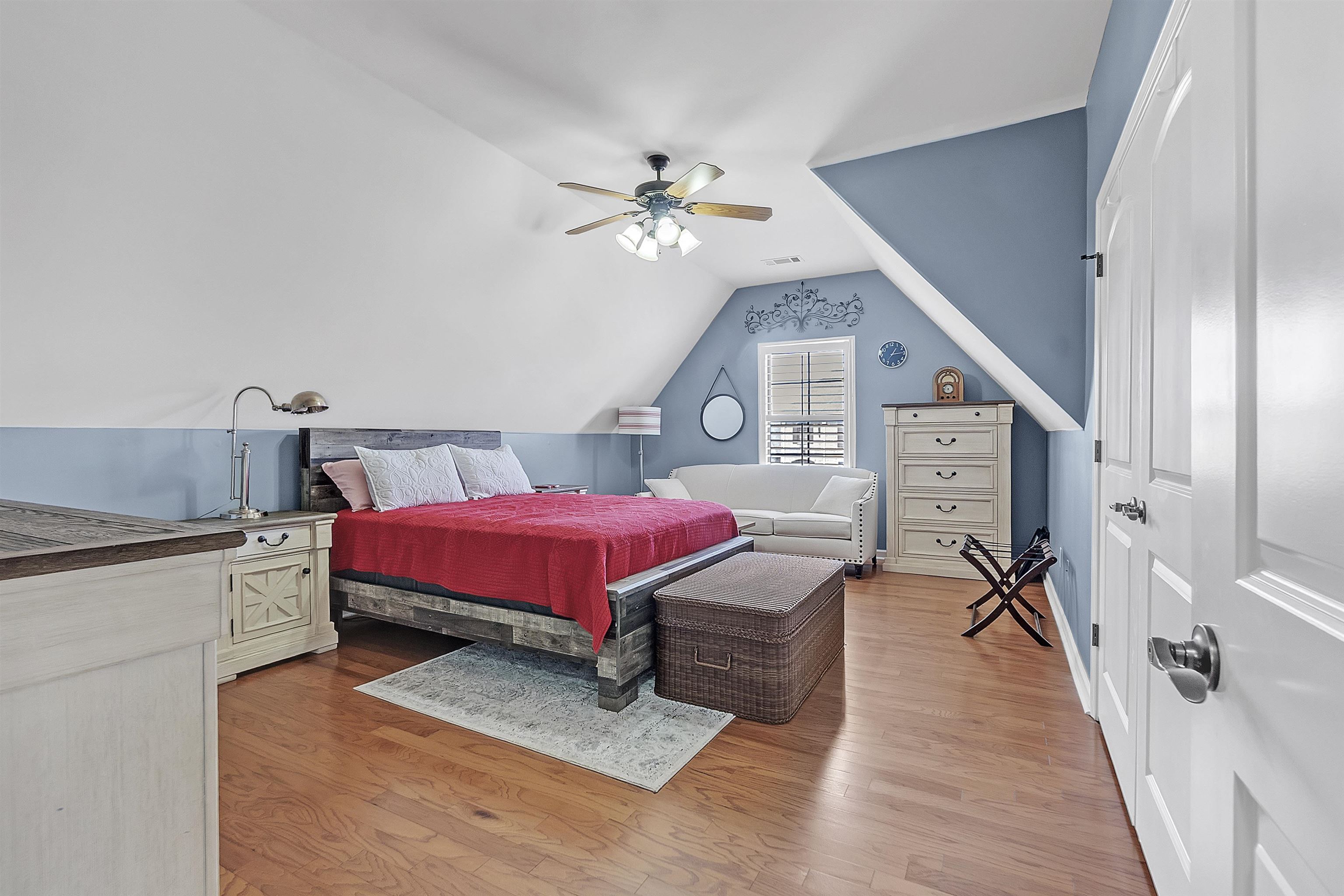 200 Misty Fields Road Oakland, TN 38060 - Photo 30 of 40 Bedroom with lofted ceiling, light wood-type flooring, and a ceiling fan