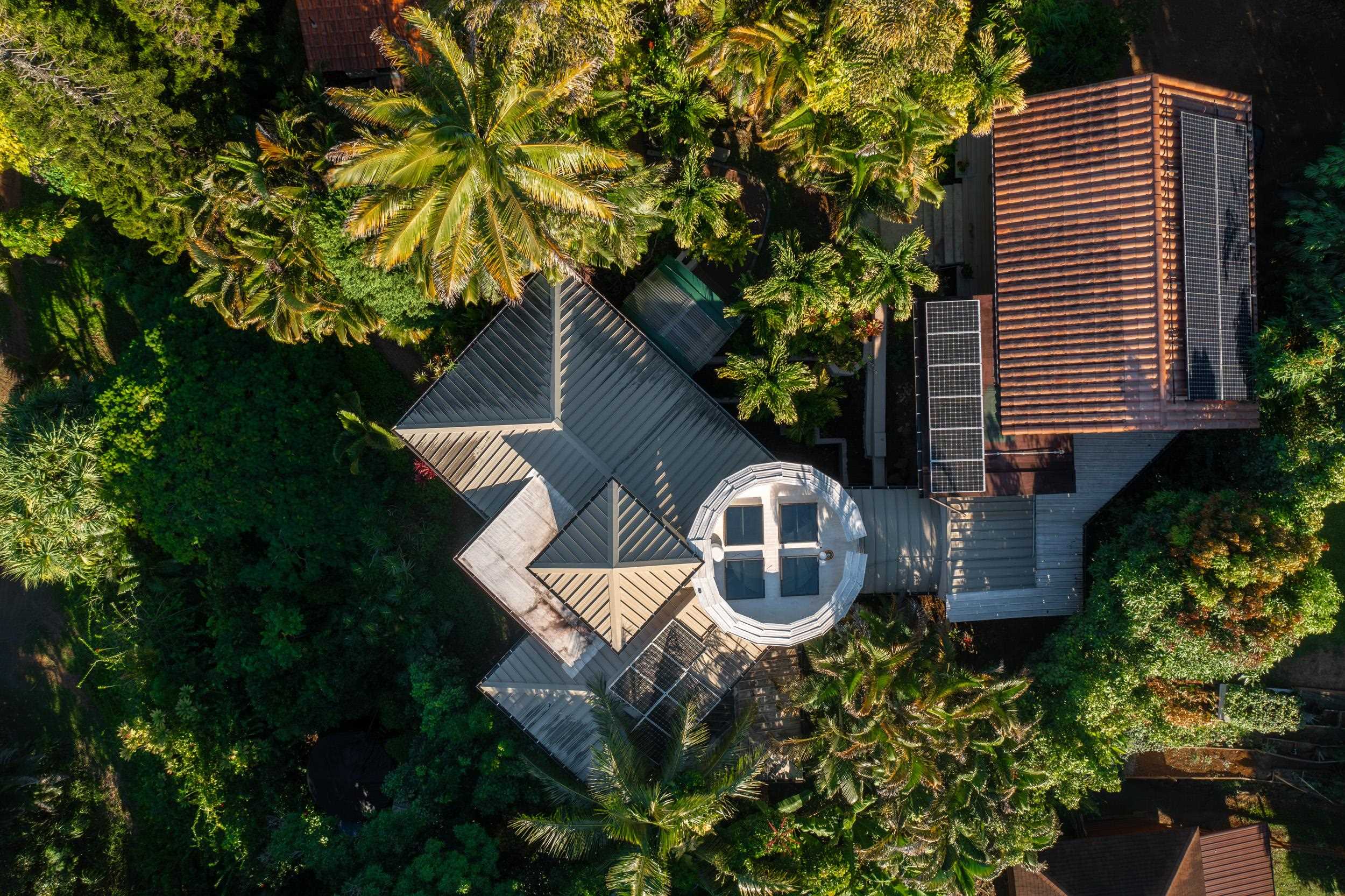 715 North Honokala Road Haiku, HI 96708 - Photo 32 of 50 a front view of house with yard and trees around