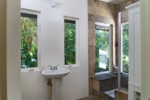 a view of a hallway with washer and dryer