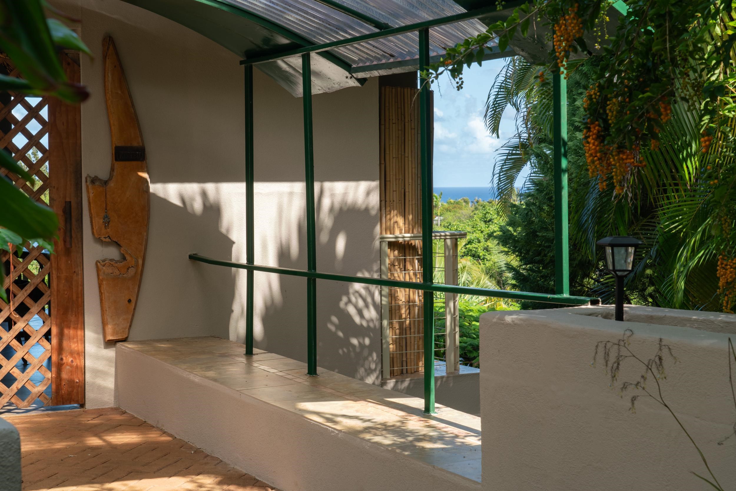 715 North Honokala Road Haiku, HI 96708 - Photo 10 of 50 a view of balcony with a small yard