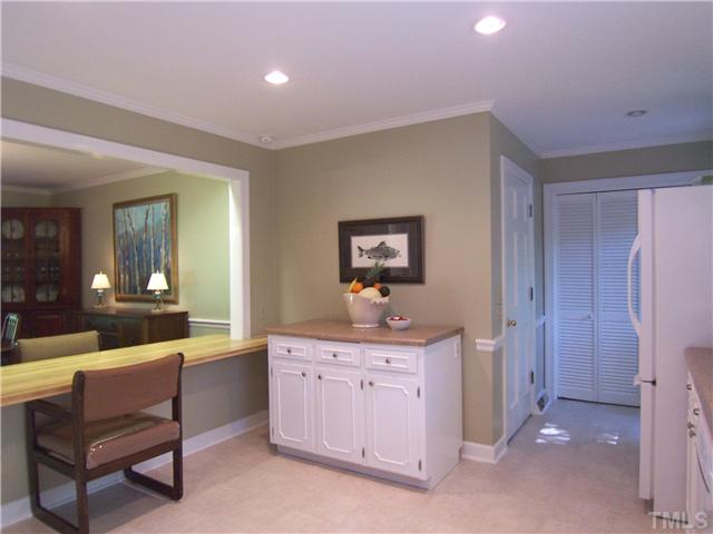 4920 Brookhurst Place Raleigh, NC 27609 - Photo 11 of 24 a living room with furniture and a wooden floor