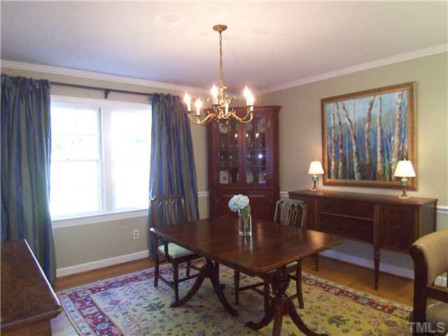 4920 Brookhurst Place Raleigh, NC 27609 - Photo 5 of 24 a dining room with furniture and window