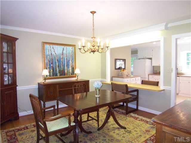 4920 Brookhurst Place Raleigh, NC 27609 - Photo 6 of 24 a dining room with furniture and window