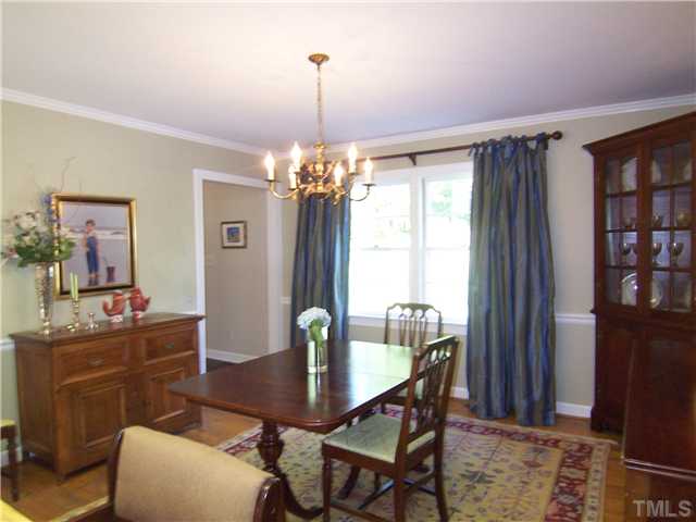 4920 Brookhurst Place Raleigh, NC 27609 - Photo 7 of 24 a dining room with furniture and window