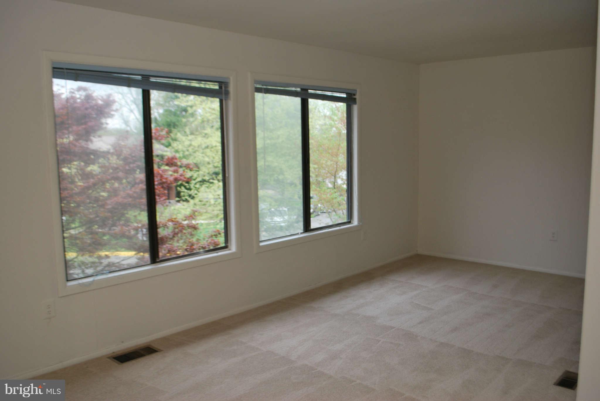 9116 Centerway Road Gaithersburg, MD 20879 - Photo 11 of 25 an empty room with a window