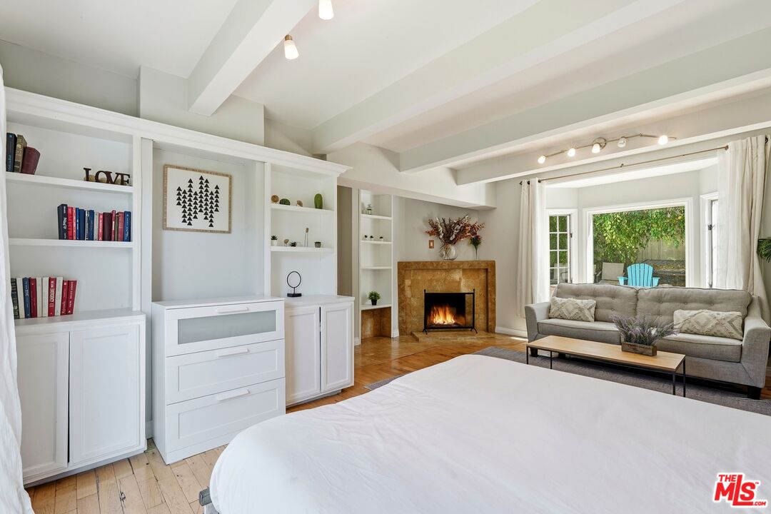 2955 Corral Canyon Road Malibu, CA 90265 - Photo 10 of 21 a bedroom with a bed and a couch