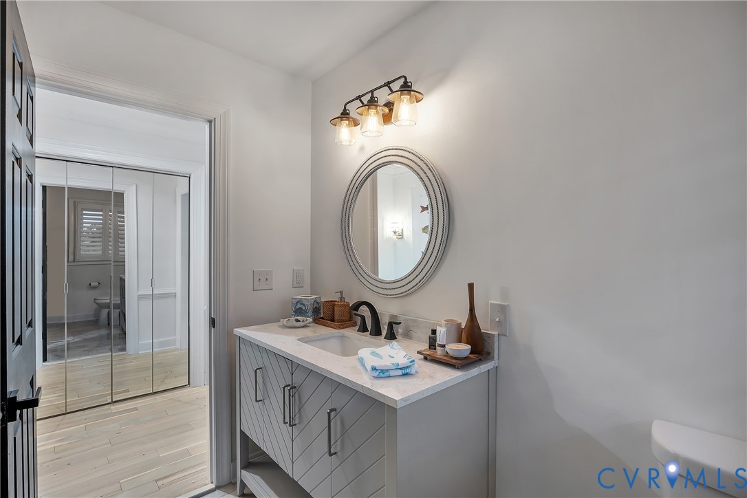 467 Daingerfield Road Tappahannock, VA 22560 - Photo 23 of 50 a bathroom with a sink and a mirror