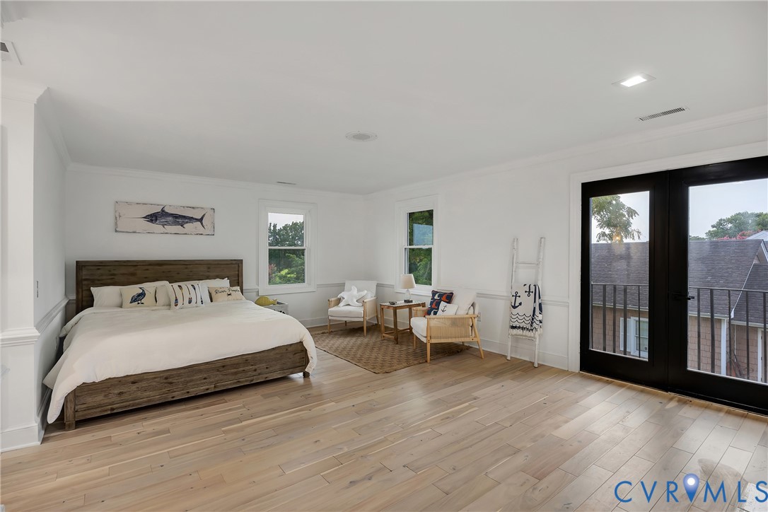 467 Daingerfield Road Tappahannock, VA 22560 - Photo 24 of 50 a bedroom with double bed and a large window