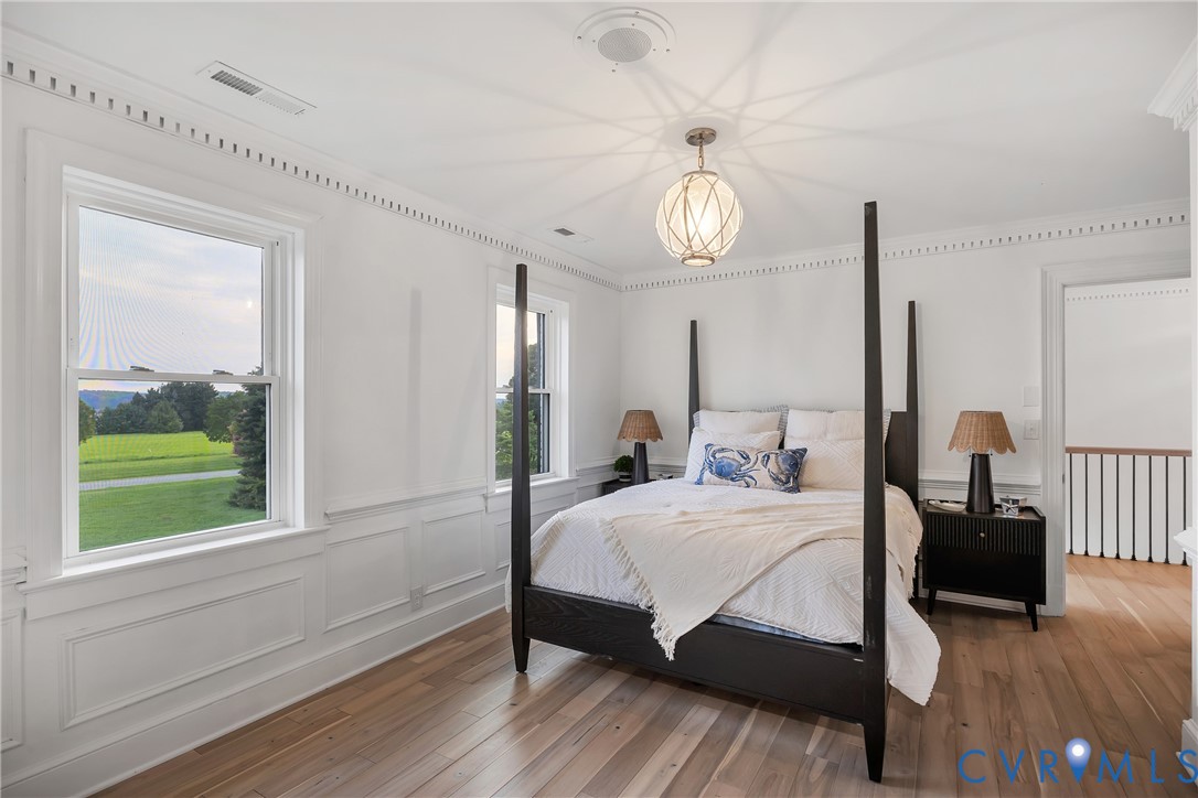 467 Daingerfield Road Tappahannock, VA 22560 - Photo 29 of 50 a bedroom with a bed and a window