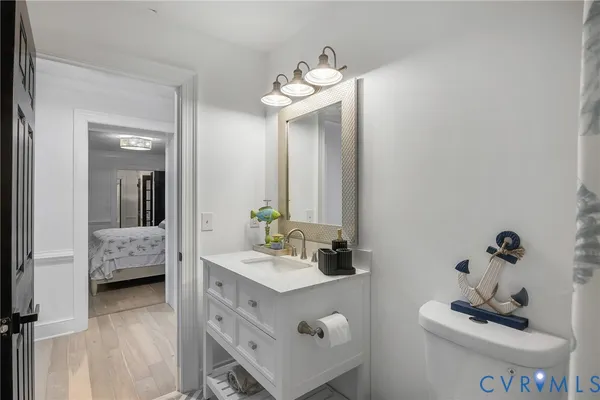 a bathroom with a double vanity sink and mirror