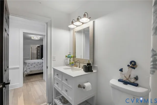 a bathroom with a double vanity sink and mirror